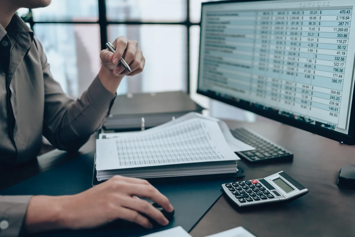 Financial statements and accounting reports spread on desk